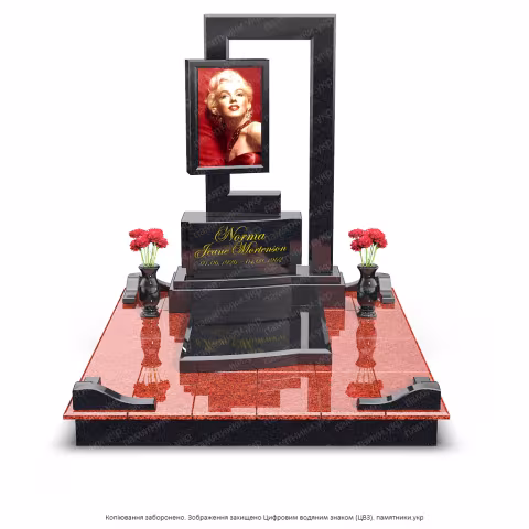 Памятник в современном стиле с прямоугольной аркой из черного полированного камня.